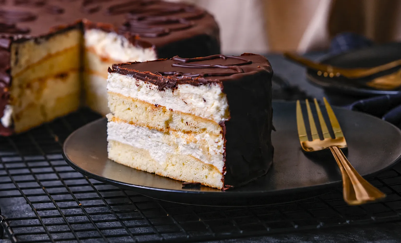 Bird's Milk Cake — Light sponge, airy soufflé filling, glossy chocolate glaze — a beloved classic reimagined